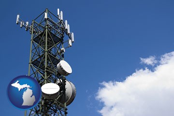 a telecommunications tower, with blue sky background - with Michigan icon