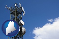 maine map icon and a telecommunications tower, with blue sky background