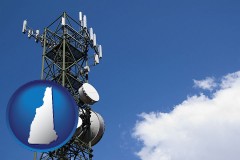 new-hampshire map icon and a telecommunications tower, with blue sky background